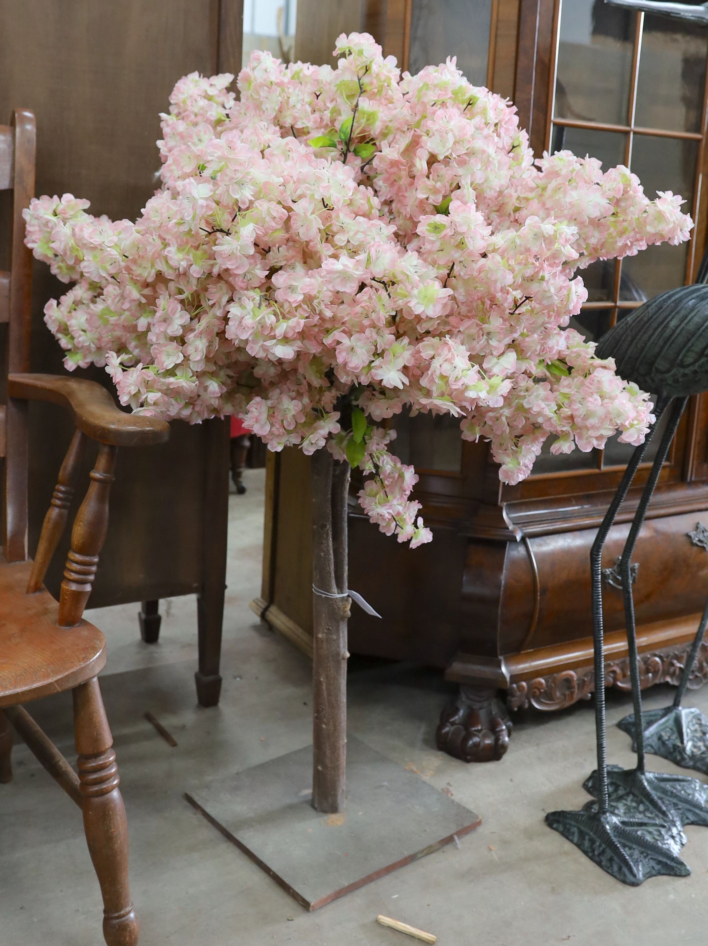 A small faux cherry blossom tree ornament, height 110cm